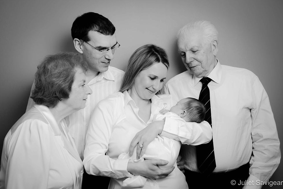 Family Portrait With Newborn Baby