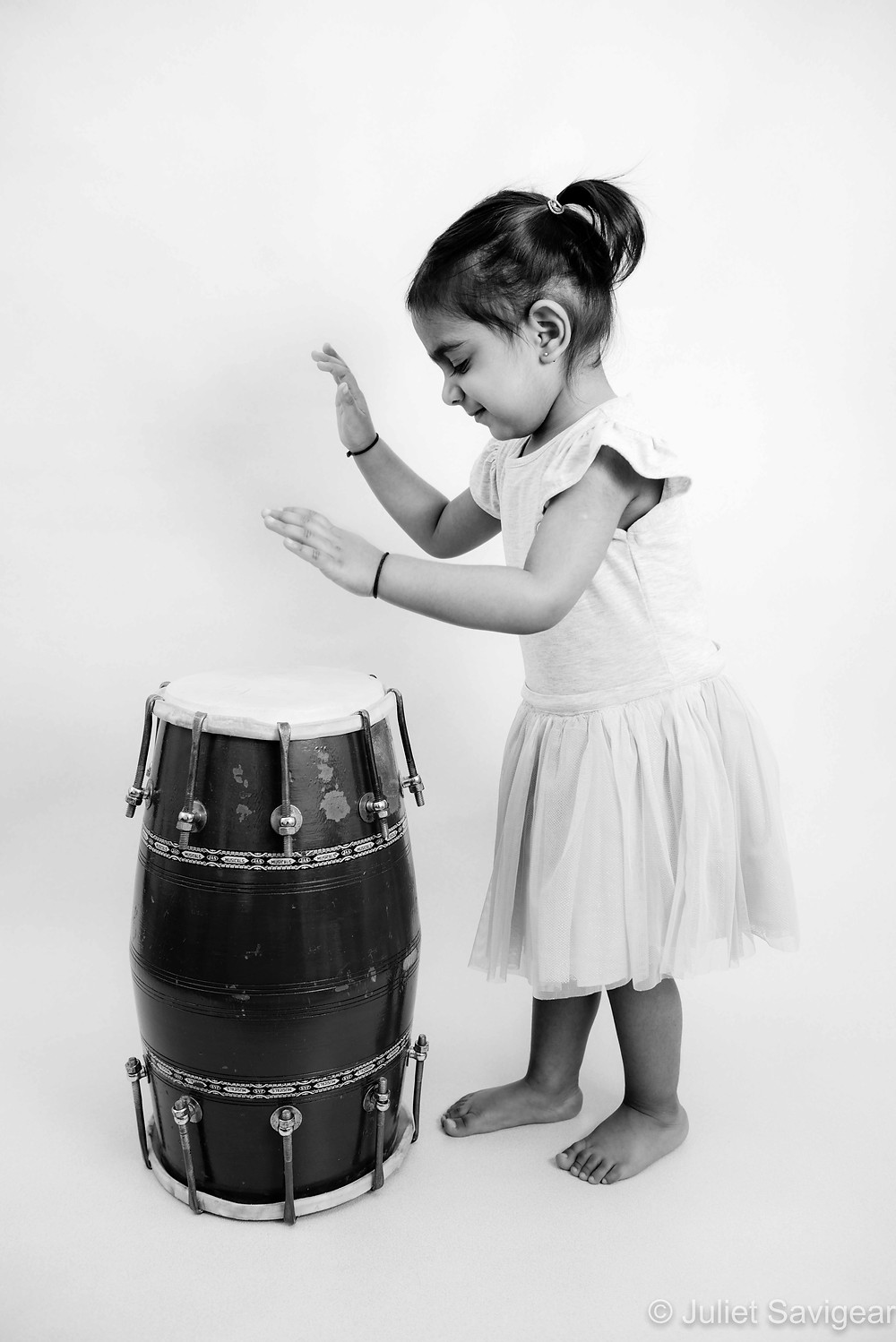 Child playing the dhol