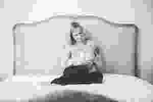 Mother & baby on bed