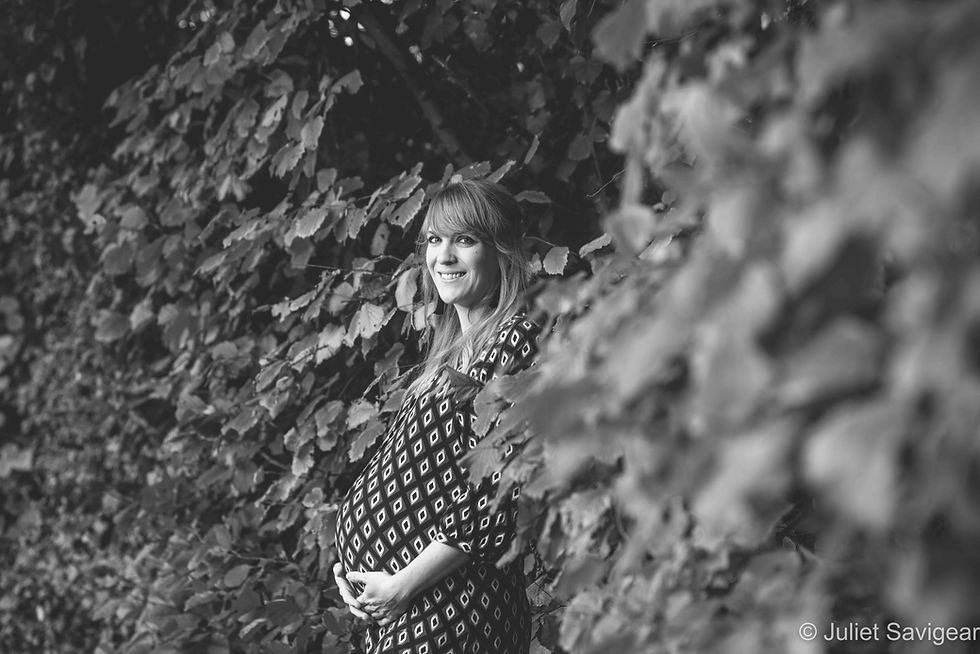 Pregnant lady among the leaves