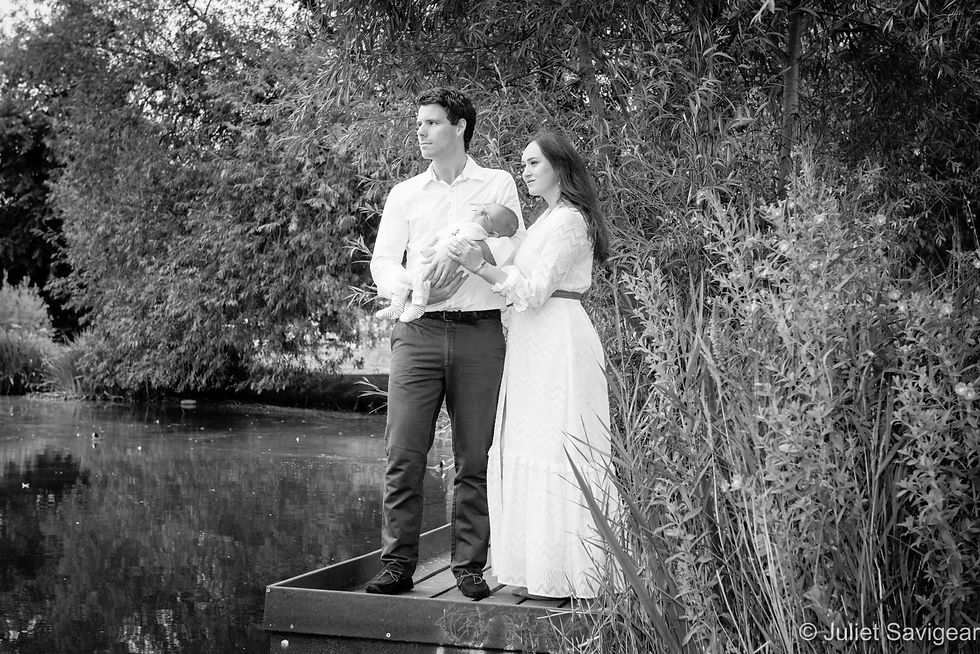 Family portrait by pond