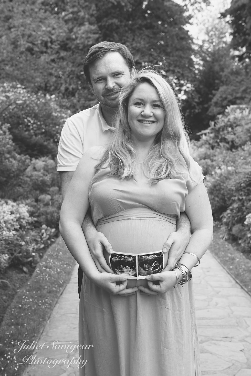Twins pregnancy photo shoot outdoors in Streatham