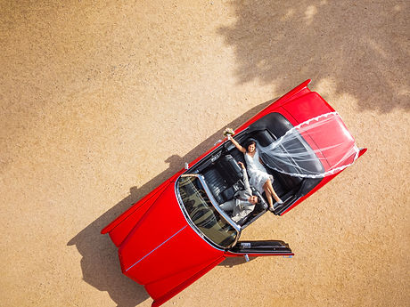 wedding couple relaxes in the cool car b