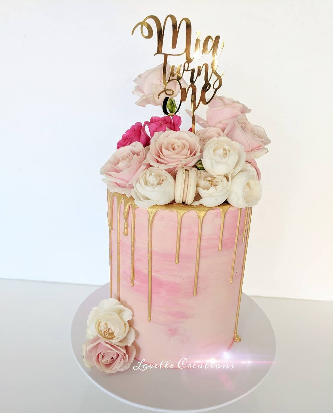 Floral painted drip cake