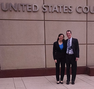 A picture of Chris Madel and Jenny Robbins outside of Minneapolis Federal Courthouse after their jury-trial win.