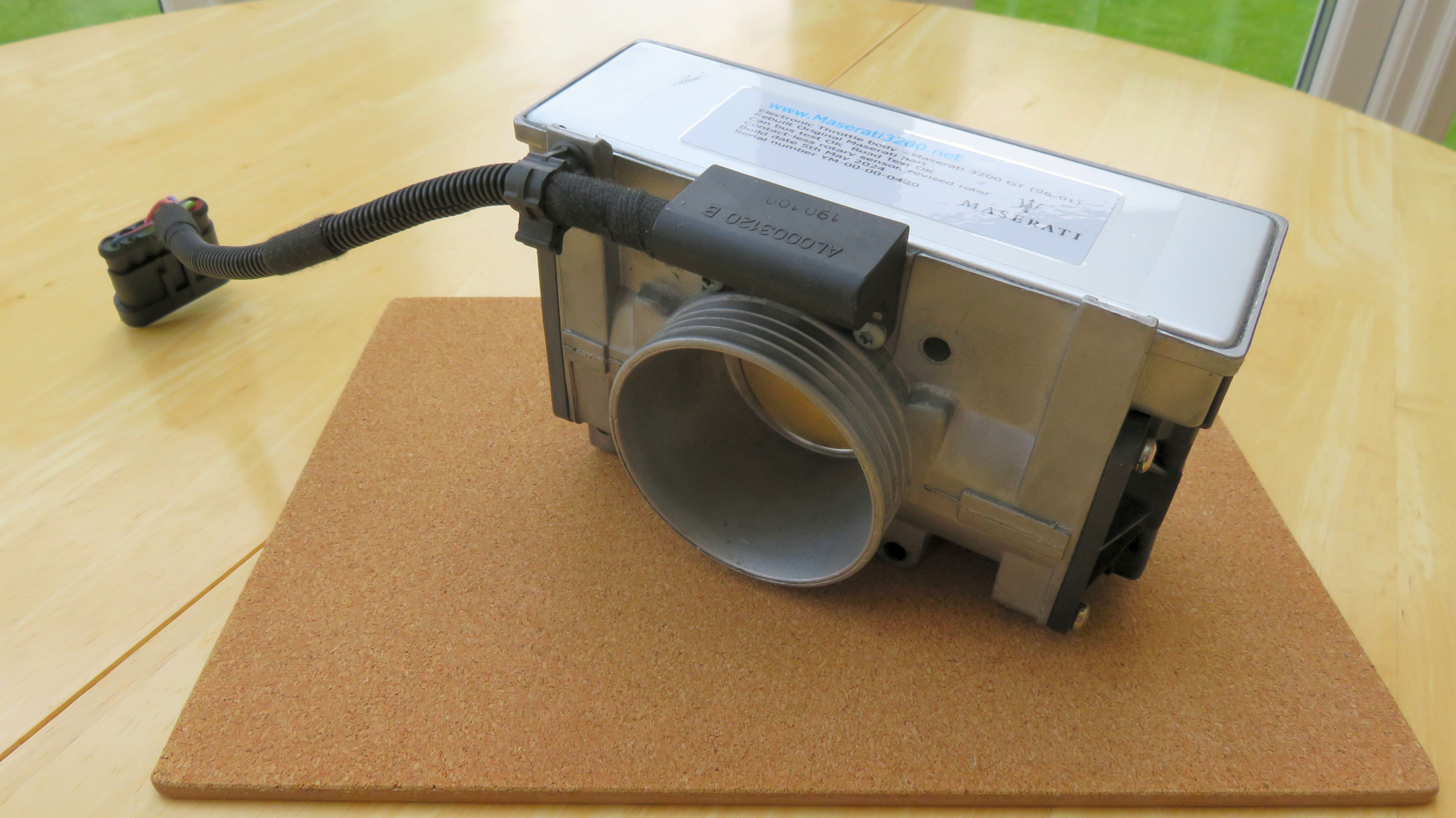 Refurbished Original Maserati 3200 throttle body P/N 585064604