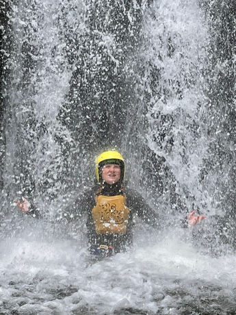 in waterfall in Kaumira canyon