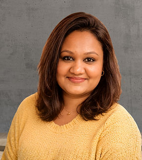 Warm headshot in vibrant yellow sweater_edited_edited_edited.jpg