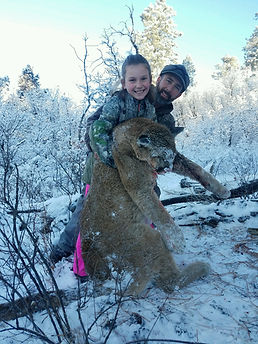 Ben & Taylor after a successful mountain lion hunt