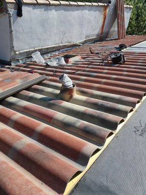 Travaux de Refection totale de toitu