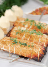 Catering platter of fresh salmon fillets as part of our catering menu served to guests for a wedding dinner