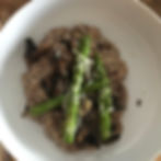 mushroom risotto dinner with asparagus and red wine