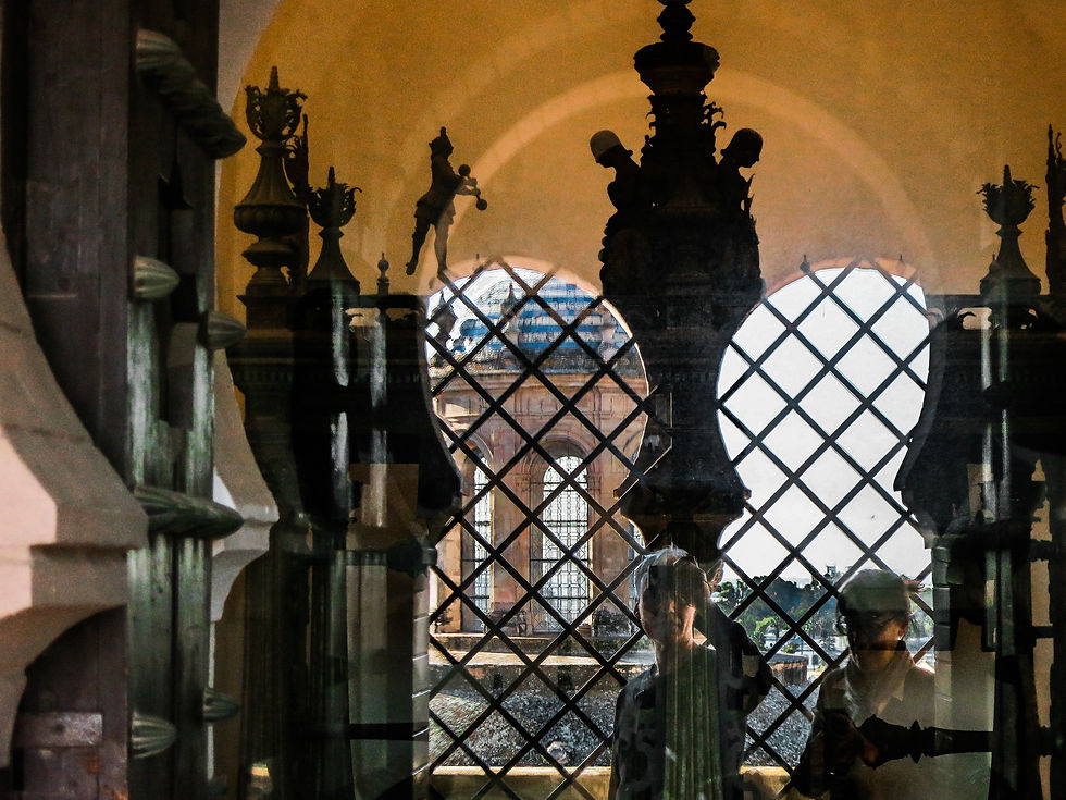 Seville Cathedral - view from the Giralda bell tower - reflection of the photographer shooting the dome out a window, Seville, Spain