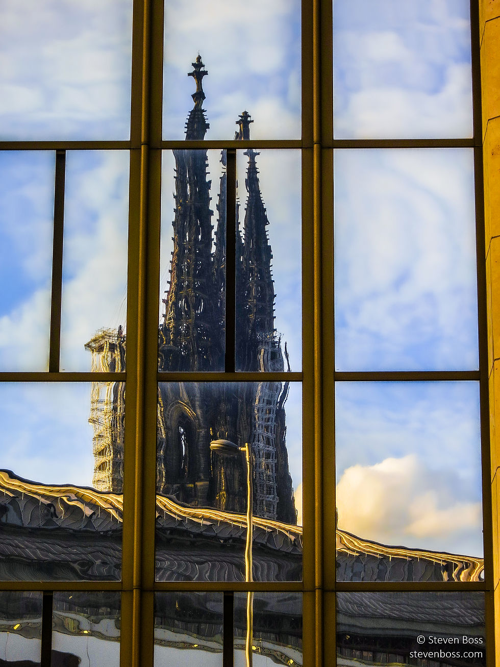 Cologne Cathedral - reflection of the spires in a window, Cologne, Germany