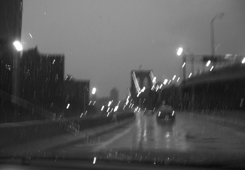 Brooklyn Bridge in the pouring rain in black & white, New York, NY