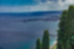 View past the cypress trees down the hill & down the coast to the south, Taormina, Sicily