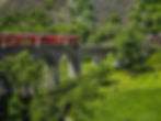 Kreisviadukt von Brusio (a spiral viaduct) & cows below - from the window of the Bernina Express, Brusio, Switzerland