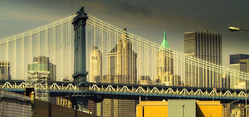 Manhattan Bridge with the downtown skyline in bright sunlight, New York, NY