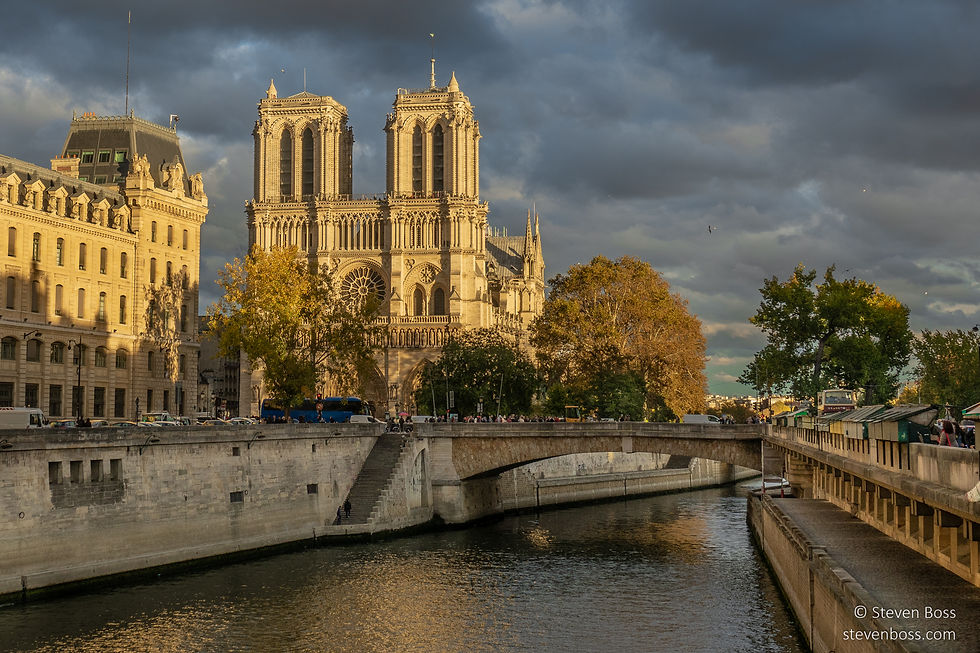 Notre Dame Cathedral in late day sun, the Seine & the Petit Pont, Paris, France