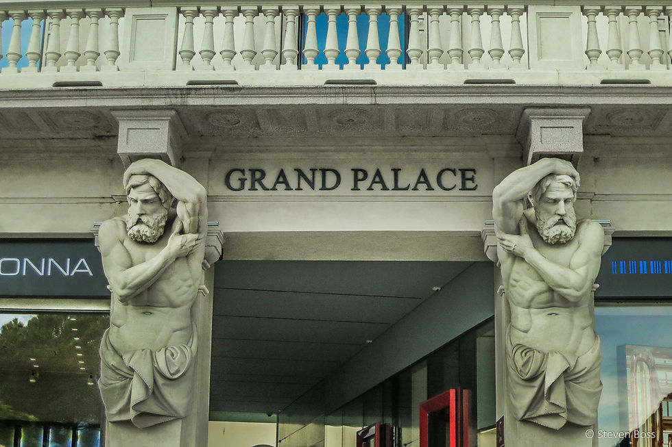 Statues adorning façade of old Grand Palace Hotel, Lugano, Switzerland