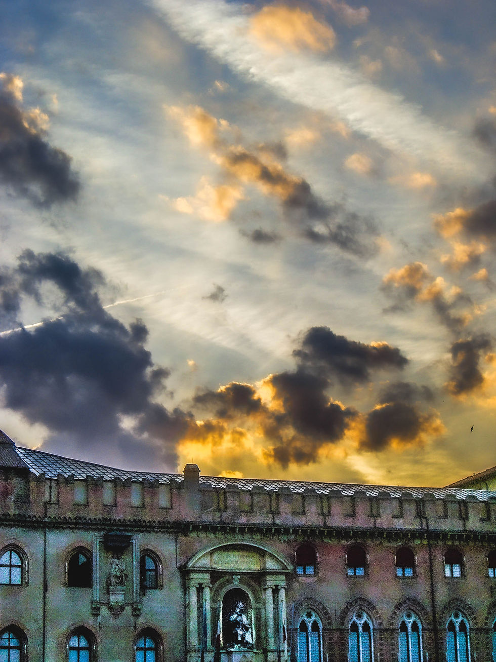 Painterly view of clouds over the square at dusk, Bologna