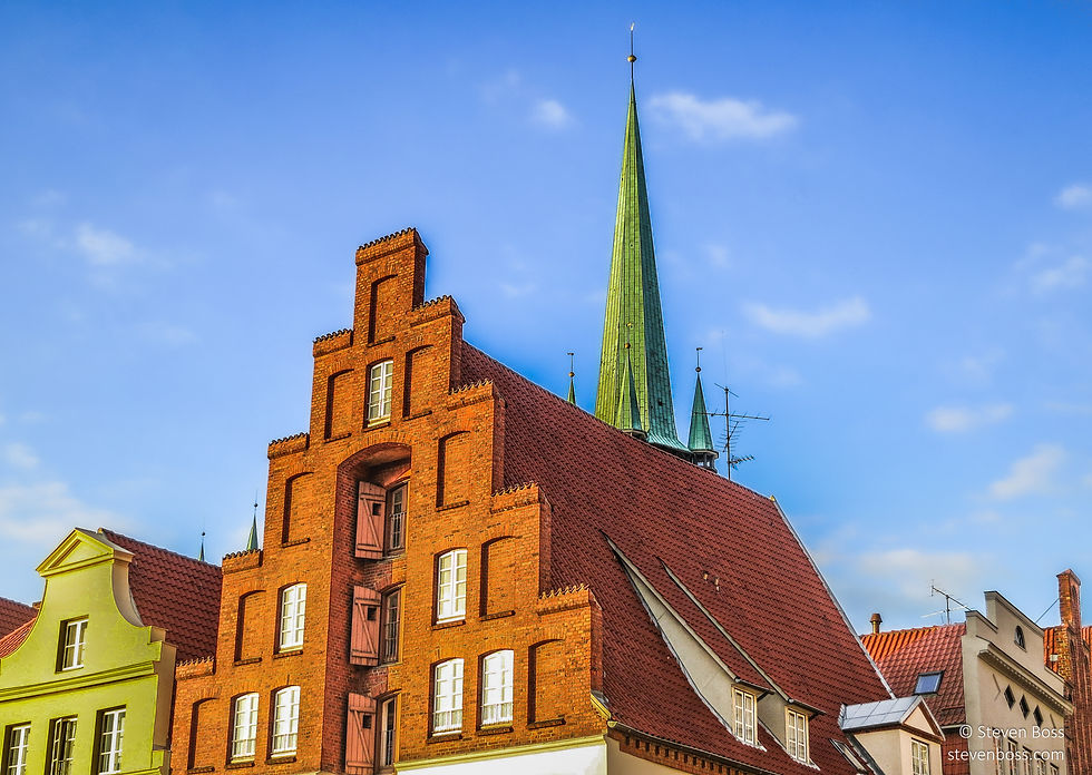 The tower of Petrikirche over the buildings #5, Lübeck, Germany
