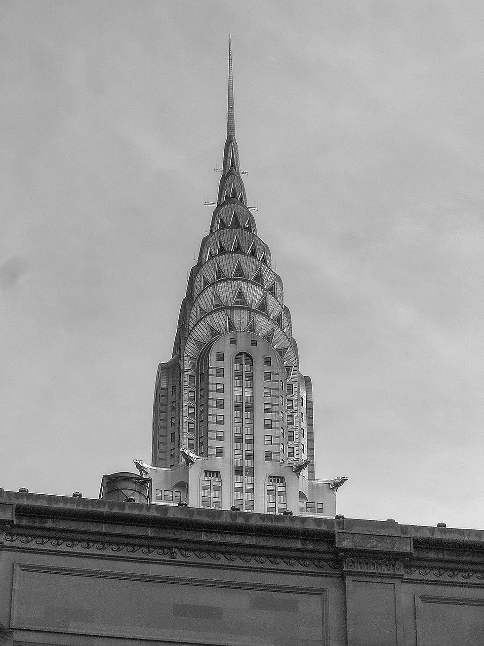 The upper floors of the Chrysler Building above the top of Grand Central Terminal, New York, NY