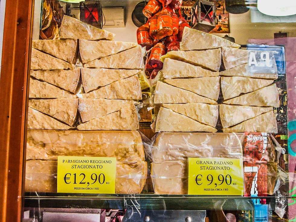 Parmigiano Reggino & Grana Padano in the window, Bologna