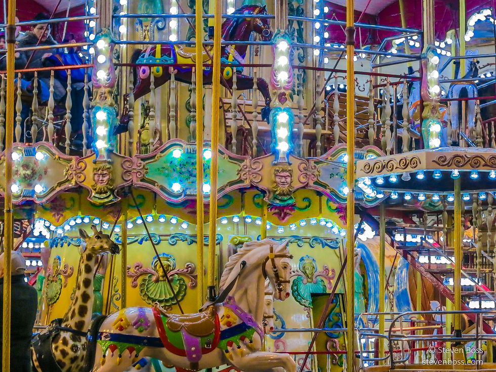The Carrousel La Belle Epoque (sitting in the forecourt of the Hôtel de Ville) close up as it revolves, Paris, France