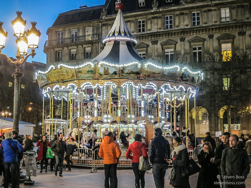 Hôtel de Ville - at night with the Carrousel La Belle Epoque in the foreground, Paris, France
