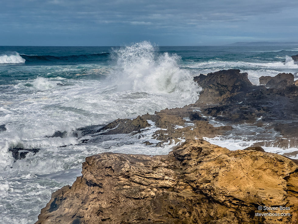 A wave crashing into the rocks, Essaouira