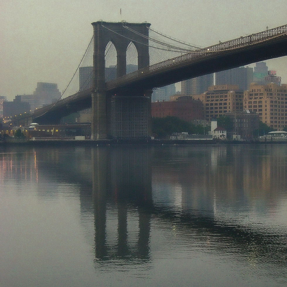 Brooklyn Bridge with reflection on a hazy early morning, New York, NY