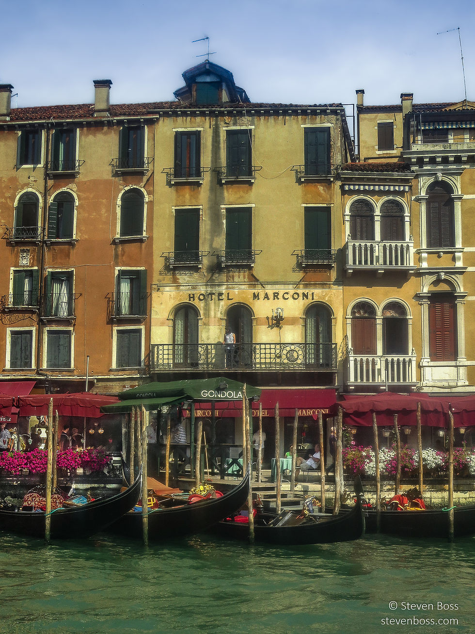 Gondolas at the gondola station at the Hotel Marconi - a painterly view, Venice, Italy