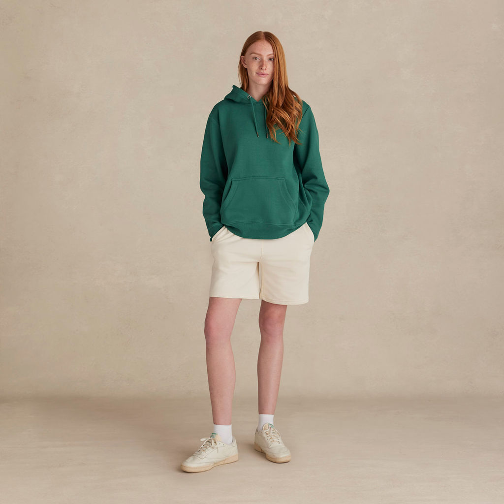 Woman wearing BayBerry Heavyweight Organic Brushed Unisex Hood by Kofa Goods