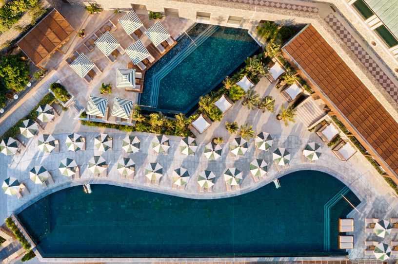 Aerial view of the pools and terraces at Daios Cove