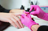 manicurist-applies-a-lok-on-nails-P8QSWZ