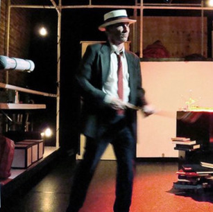As The Man From Another Planet in GEORGE BATAILLE'S BATHROBE by Richard Foreman