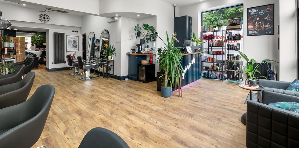 Eye-level view of a hair salon chair and colour correction tools