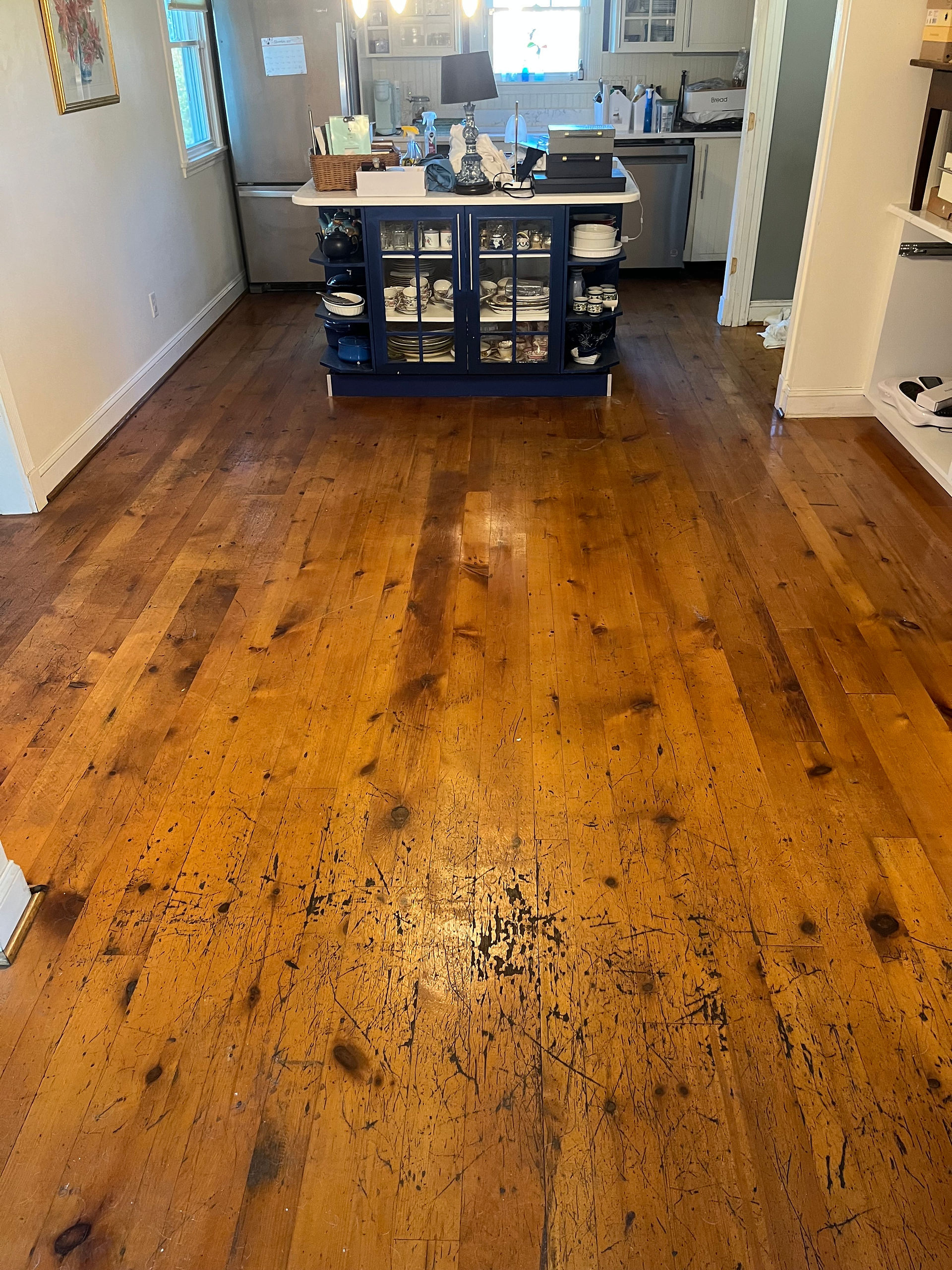 Hardwood floor restoration, before 