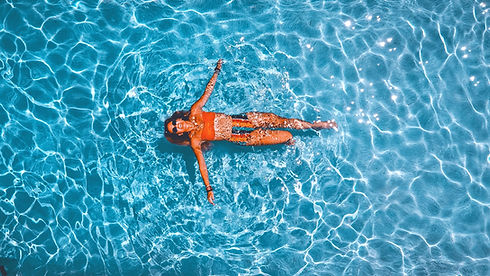 woman%20swimming%20alone%20in%20body%20of%20water_edited.jpg