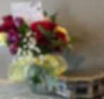 Flowers next to Beans urn.