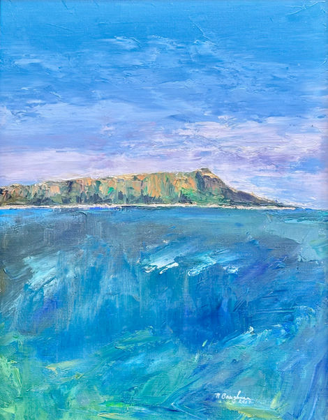 Island in the distance of blue ocean waters