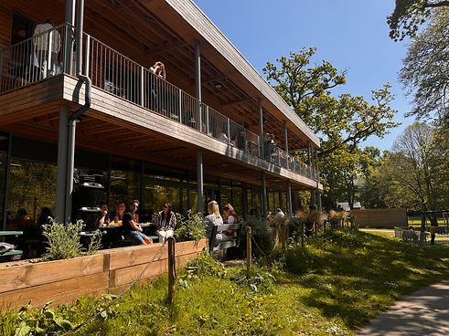 Outdoor seating at Caffi Hafan beside the River Severn