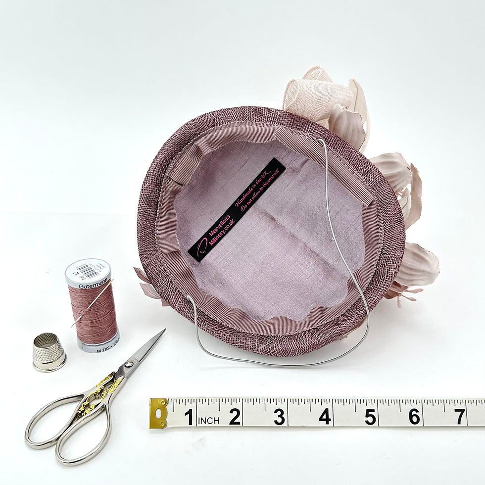 Thumbnail: Heathery Taupe and Nude Pink Wedding Fascinator Perching Hat with Orchids by Marvellous Millinery Winchester