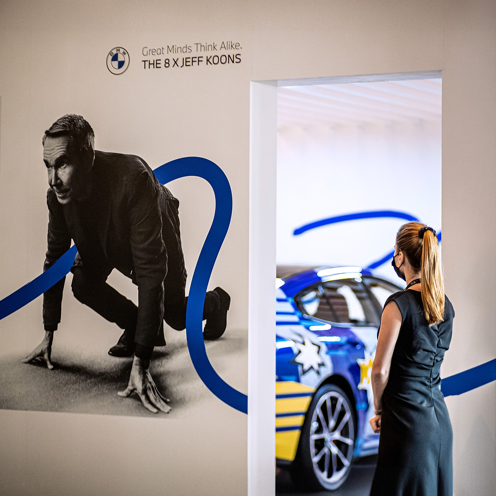 A visitor in the BMW stand at art dubai 2022