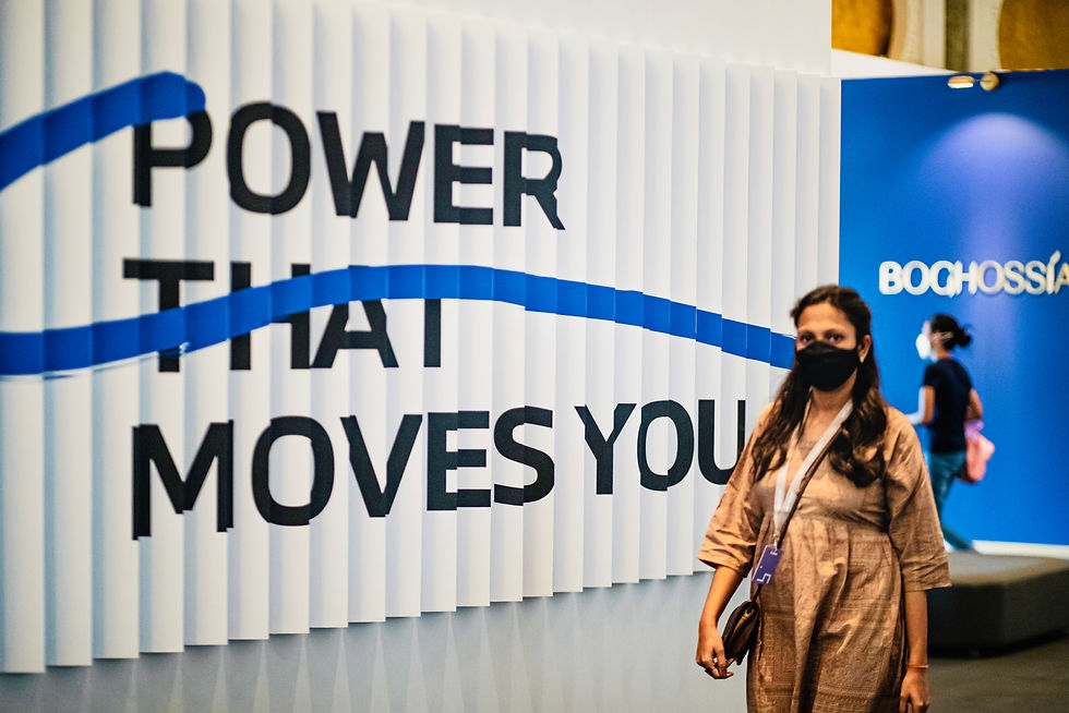 A visitor in the BMW stand at art dubai 2022