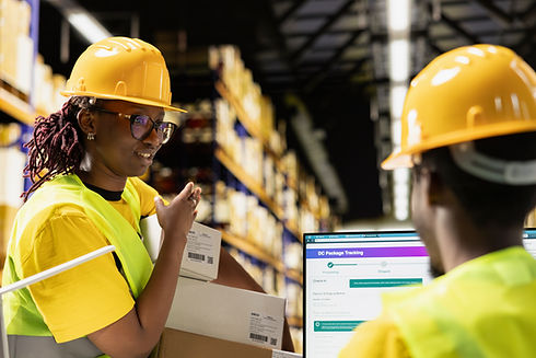 black-logistics-workers-team-handling-cargo-tracki-2026-01-11-10-55-31-utc.jpg