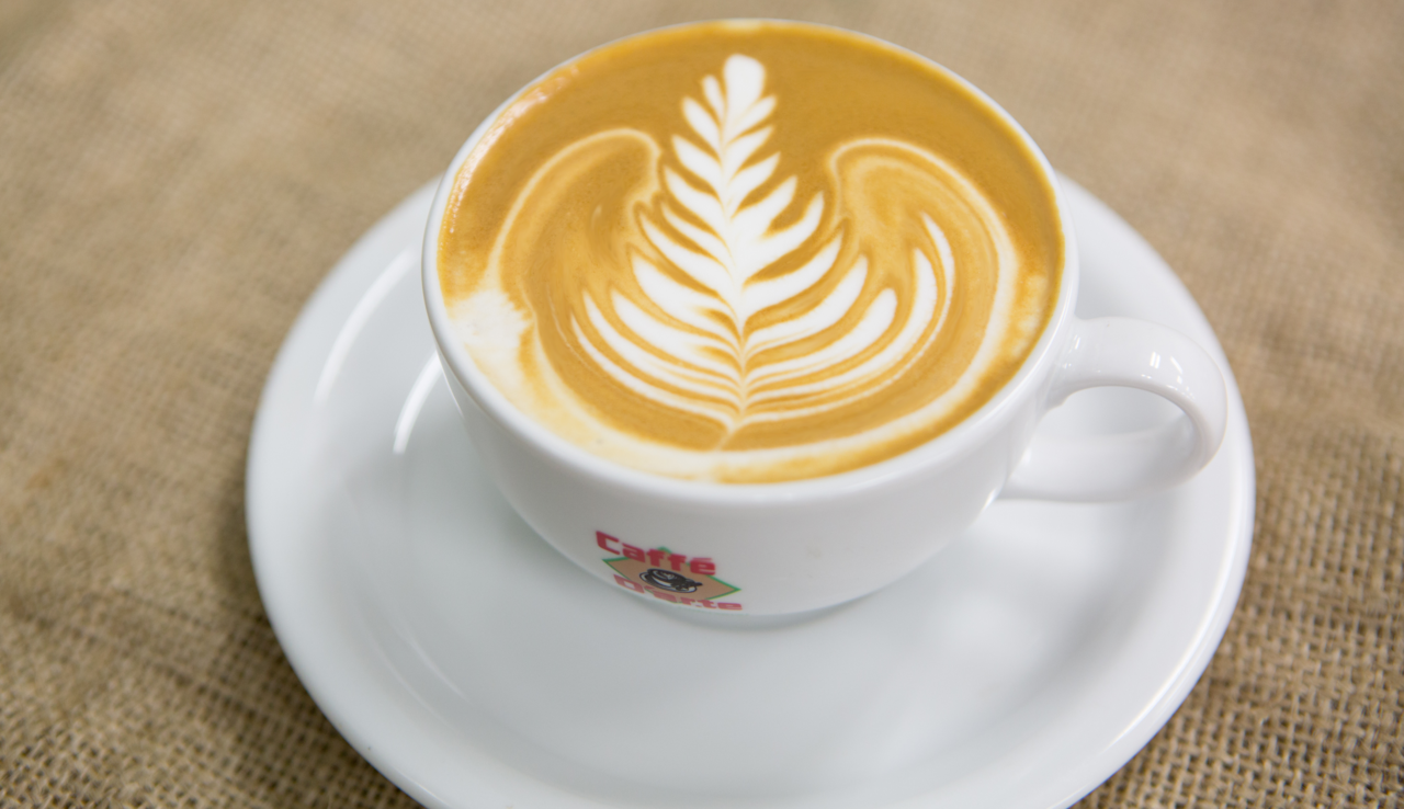 Caffé D'arte of Alaska logo