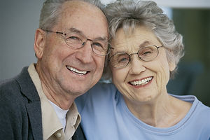 Elderly parents smiling