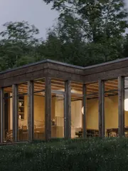 夜色林间亮起暖光的SONO住宅
SONO House glowing at the forest edge at night